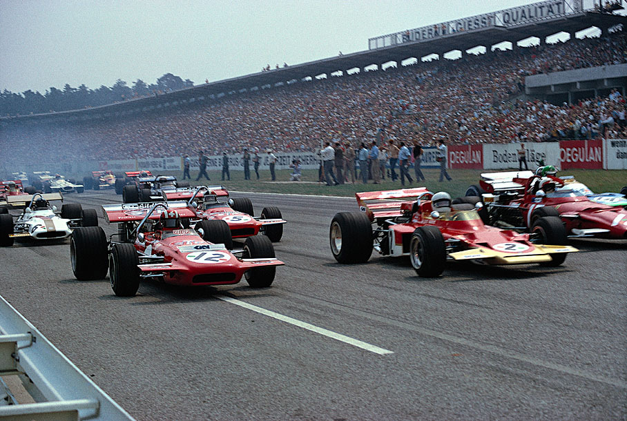 Moments after the start: Jochen Rindt (Lotus No. 2) being overtaken by 4th grid placed Jo Siffert (March No. 12), German GP Hockenheim 1970