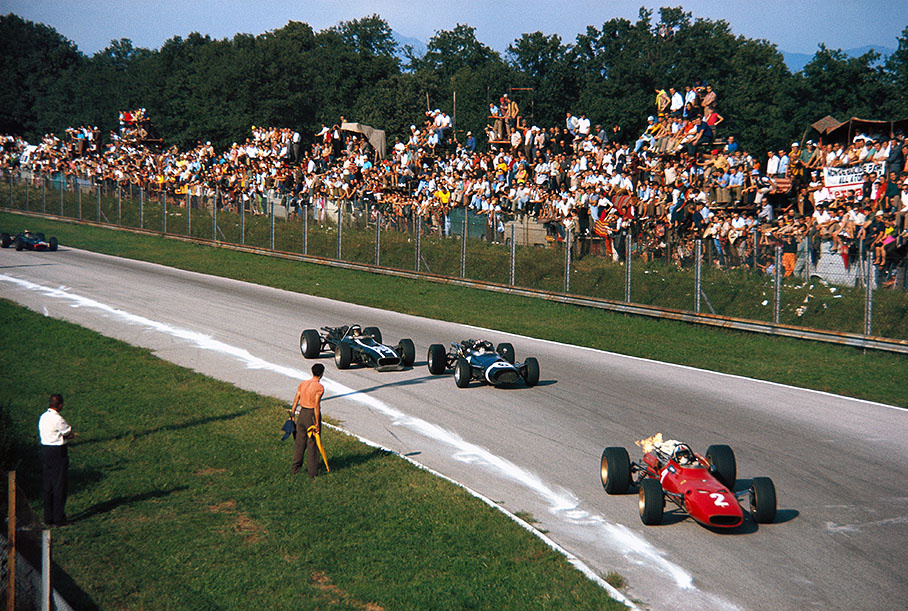 Chris Amon (No. 2, Ferrari 312) leading the two Cooper-Maserati's of Jo Siffert (No. 6, with the older T81) and Jochen Rindt (the new T86) into Parabolica
