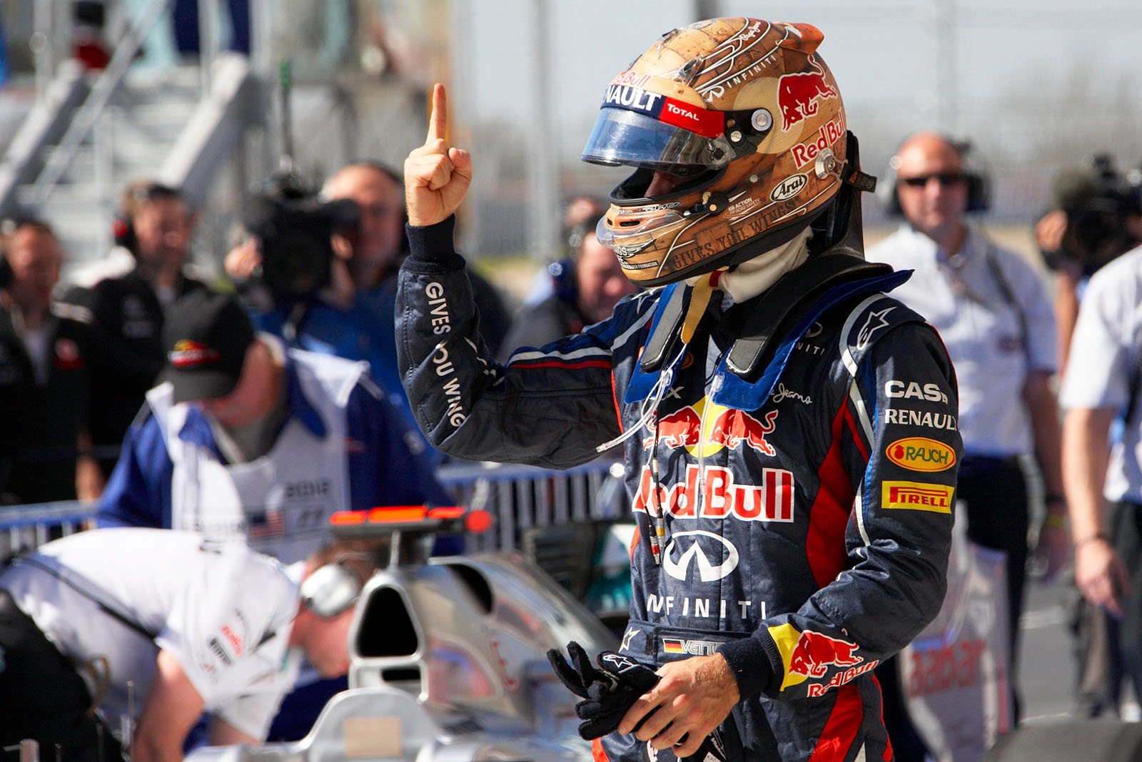 Polesetter Sebastian Vettel of RBR celebrates in parc ferme after qualifying