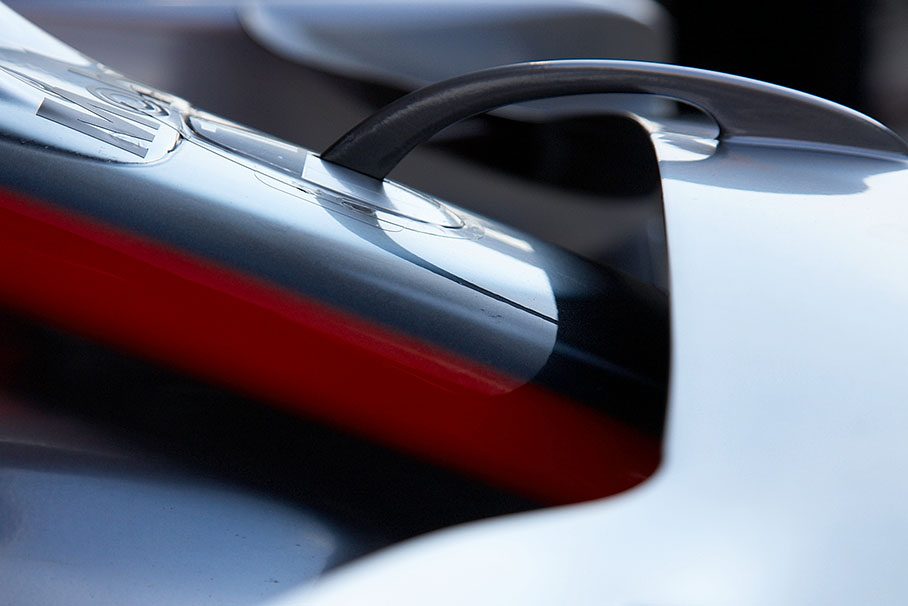 Junction of a McLaren nose cone and the front wings