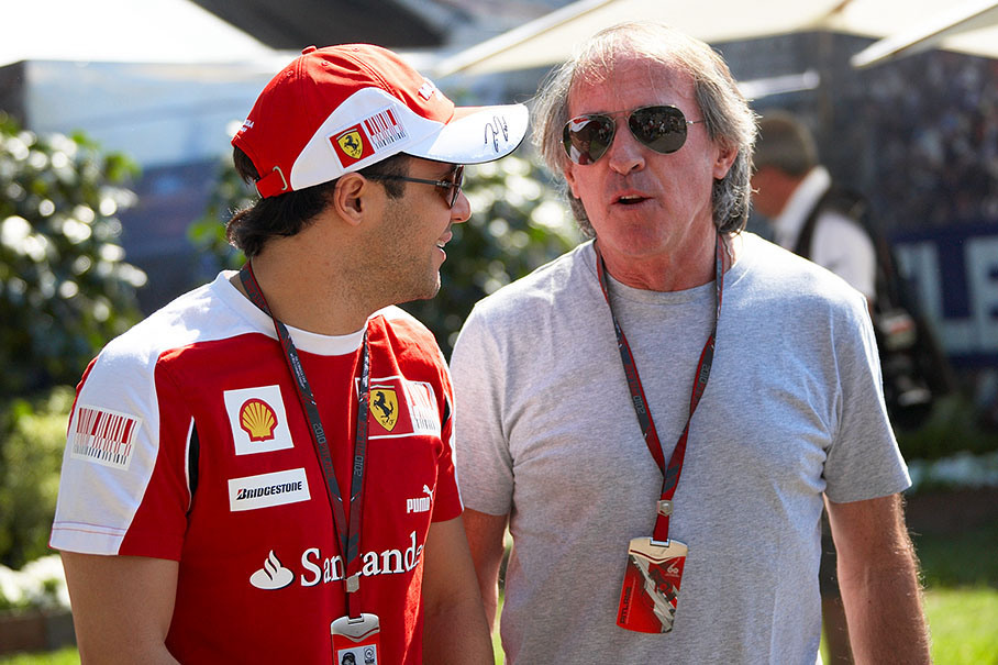 Ferrari's Felipe Massa with former F1 racing driver Jacques Laffite
