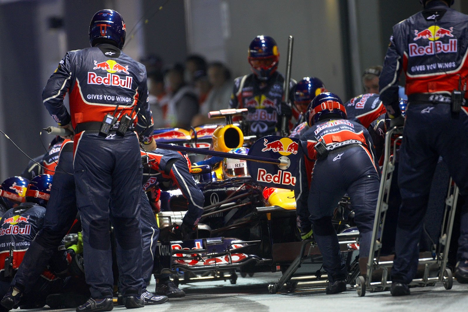 Sebastian Vettel stops at Red Bull Racing pits