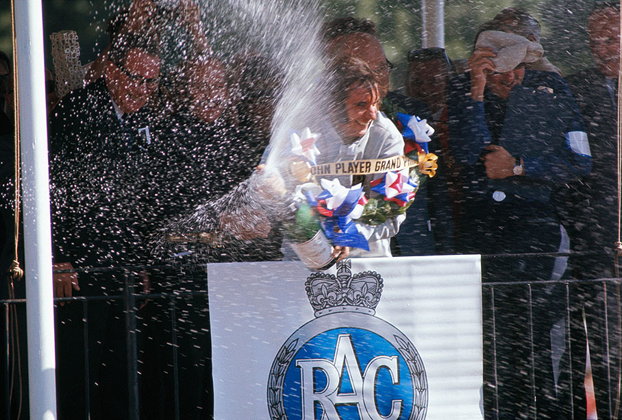 Emerson Fittipaldi celebrates his 3rd victory in the 1972 season – a big step forward to his world championship win that year.