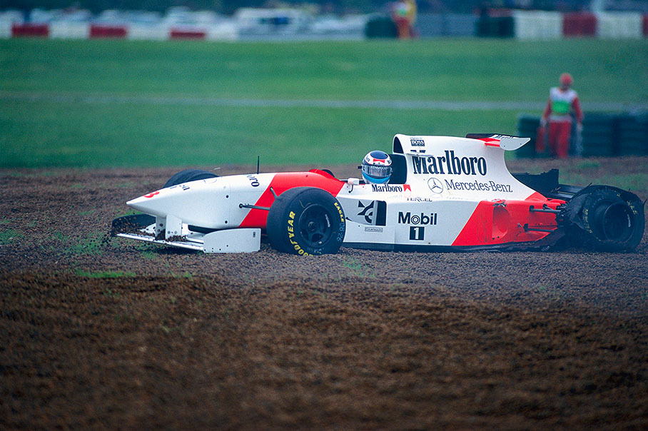 Mika Hakkinen retires with his McLaren-Mercedes MP4/10 already in first lap