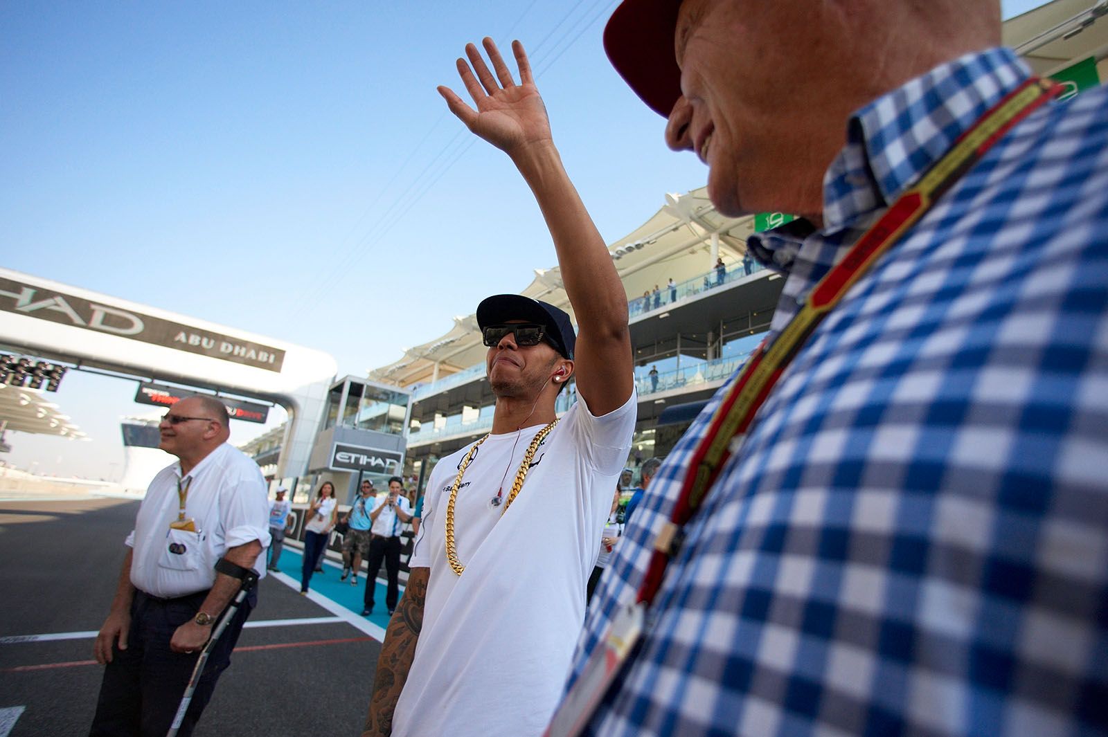 Lewis Hamilton waves towards his fans at the grandstand, Abu Dhabi Grand Prix, 2014