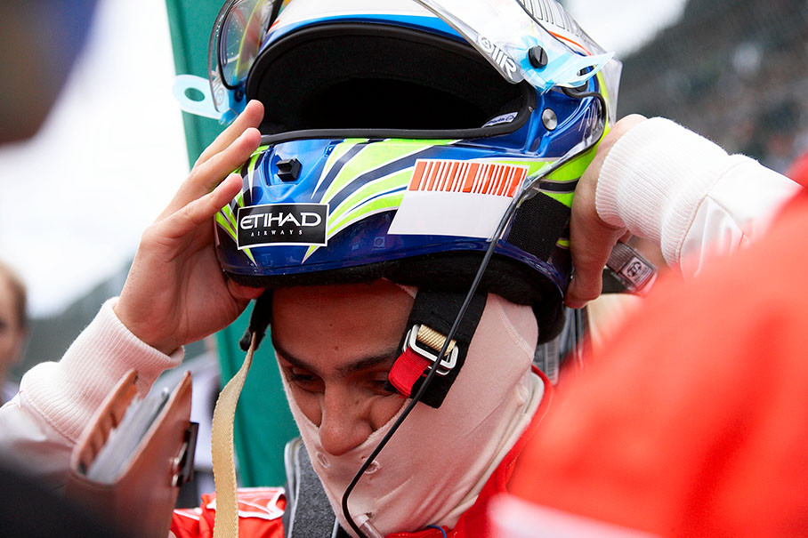 Felipe Massa takes his race helmet off
