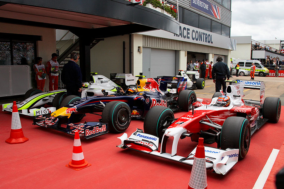 The parc ferme after qualifying - second Barrichello, polesetter Vettel and eighth qualified Glock