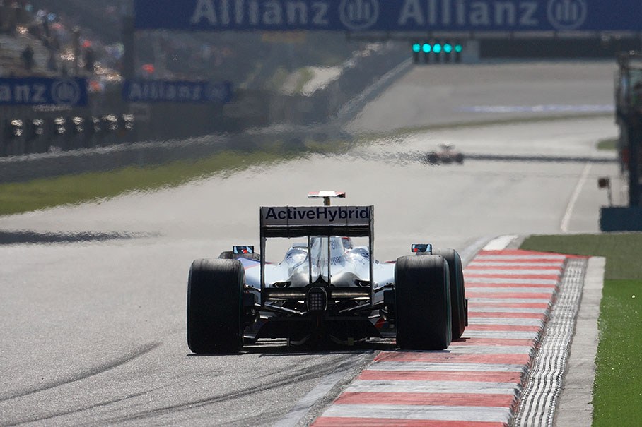 BMW Sauber's Robert Kubica on the main straight