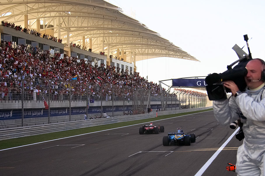 Fernando Alonso and Michael Schumacher on their honoury lap
