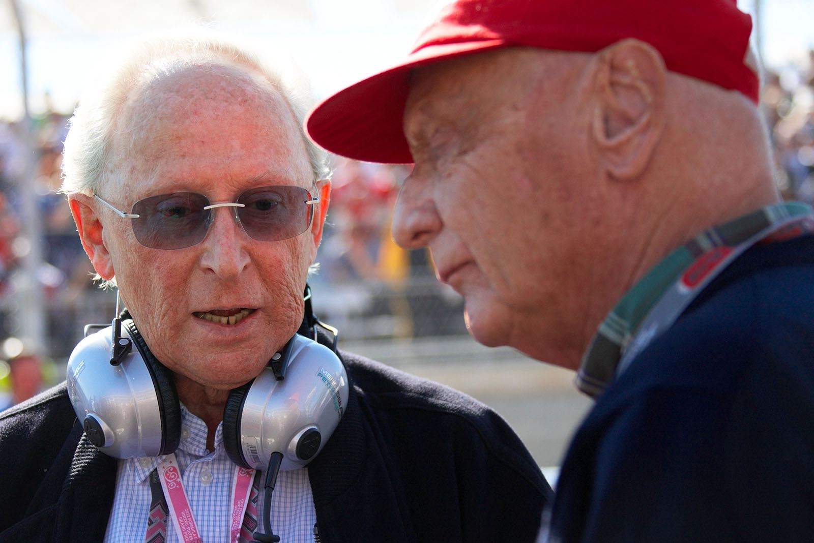 Former Mercedes manager Juergen Hubbert chats with Niki Lauda