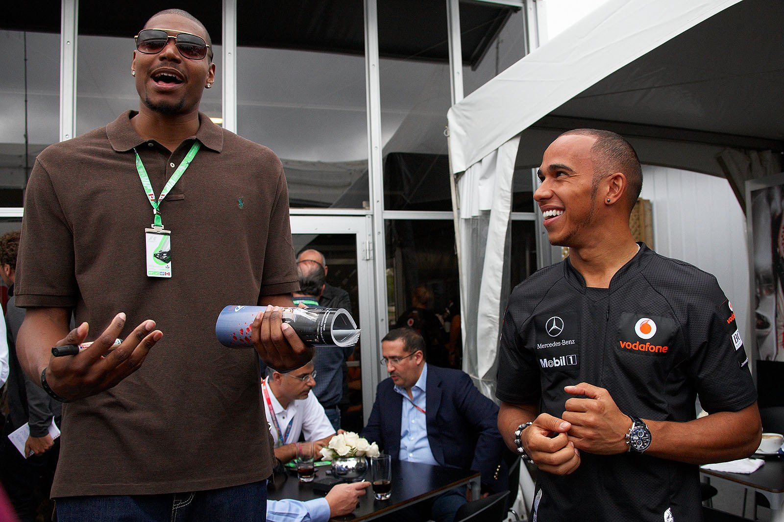 Lewis Hamilton is visited by Andrew Bynum, LA Lakers Baseball player, on Saturday afternoon