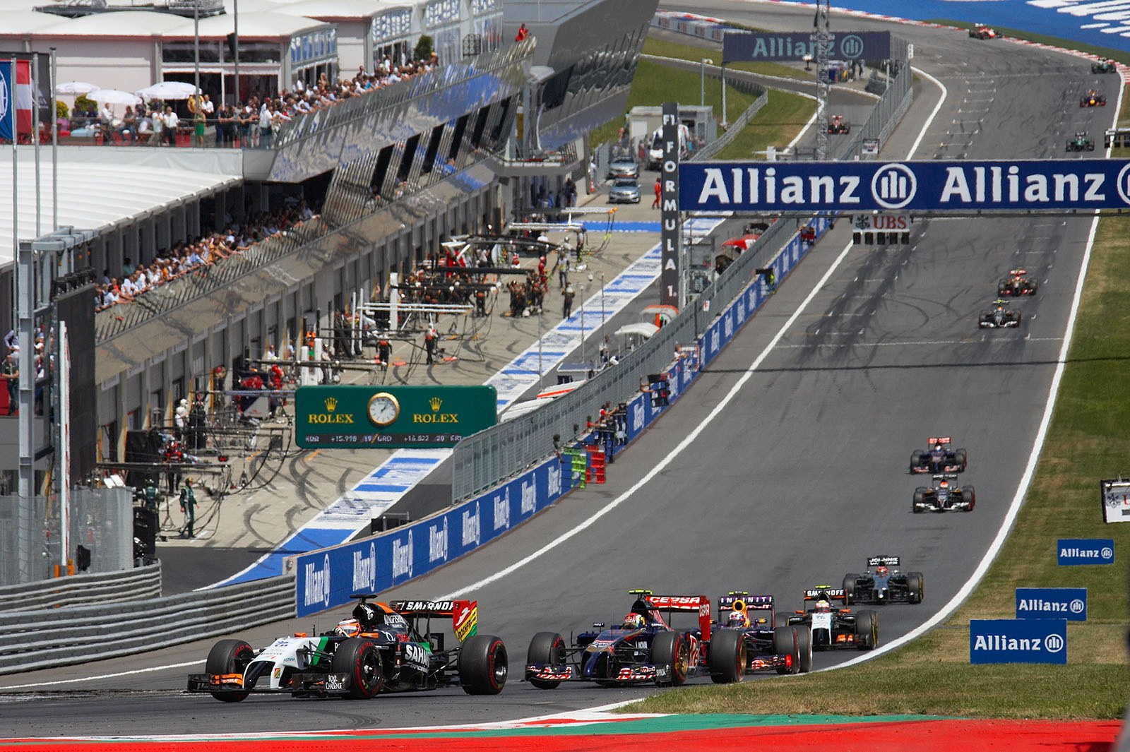 Nico Hulkenberg in his Force India, leading the midfield into turn one, Spielberg, Austrian Grand Prix, 2014