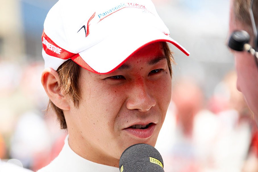 Toyota's interim driver Kamui Kobayashi is being interviewed by BBC Sports TV presenter Martin Brundle