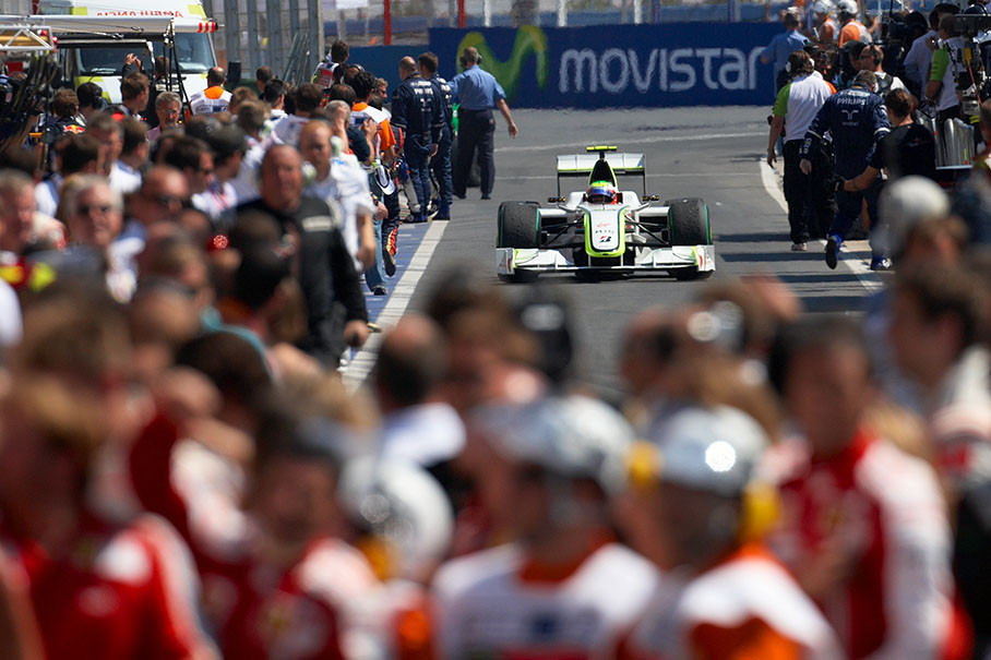 Rubens Barrichello, Brawn Grand Prix, approaches parc ferme after his honoury lap