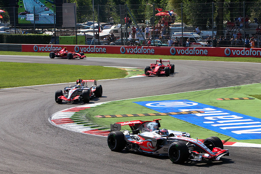 The leading four - two McLarens and two Ferarris - after one lap at first chicane