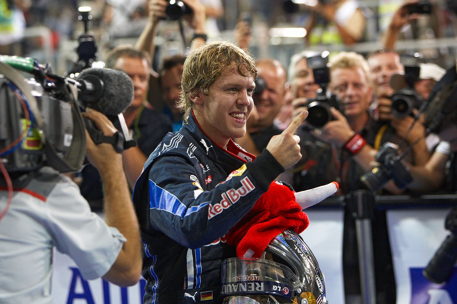 After the seasons last race, new and youngest World Champion ever Sebastian Vettel celebrates in parc ferme