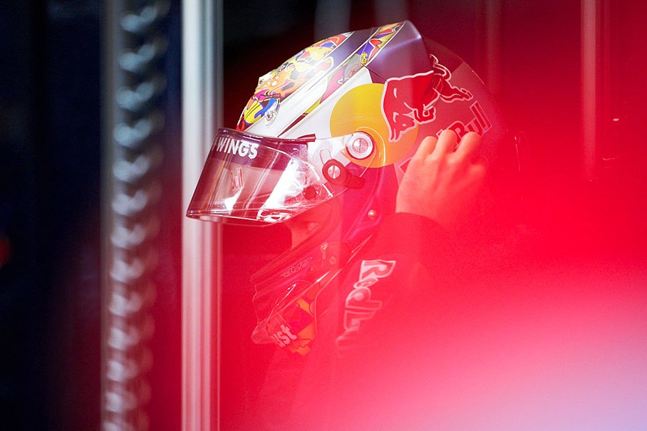 Sebastian Vettel, Red Bull Racing, puts his helmet on