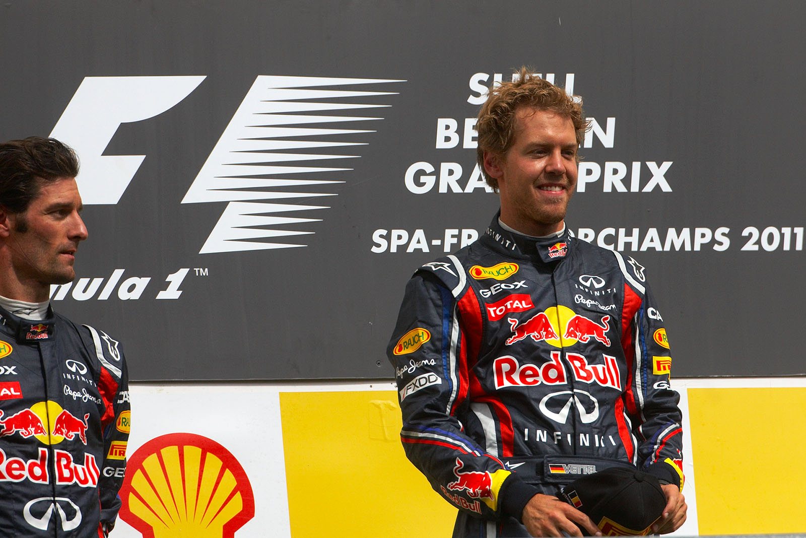 Race winner Sebastian Vettel on the podium during the ceremony after the Belgian Grand Prix 2011