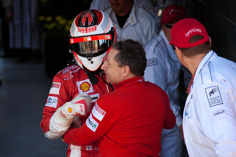 Jean Todt strongly hugs Kimi Raikkonen