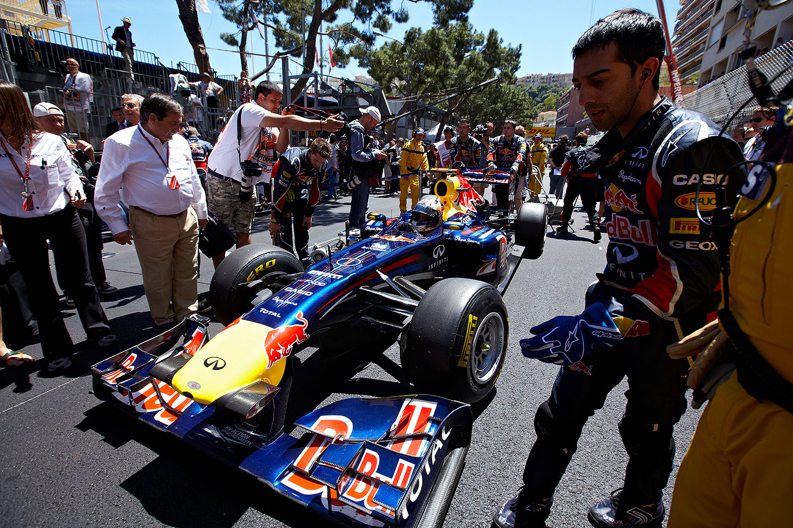Red Bull's Sebastian Vettel rolls to his front row grid position.