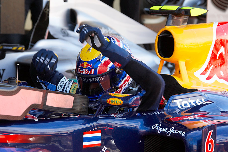 Race winner Webber climbs off his Red Bull Renault after the British GP 2010