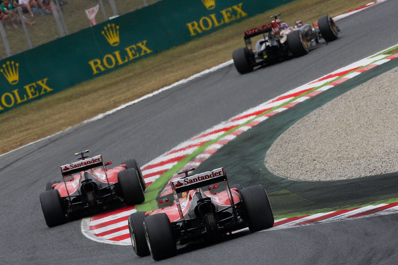 Both Ferraris of Raikkonen and Alonso (behind the Lotus of Grosjean) having a nice battle throughout the race, Spanish Grand Prix, Barcelona, 2014