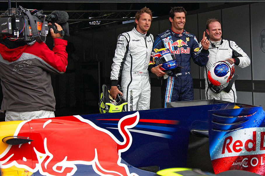 The fastest three qualifiers pose in parc ferme for the media after qualifying: Third grid placed Jenson Button of Brawn GP, polesitter Mark Webber of Red Bull and Brawn's second qualifier Rubens Barrichello