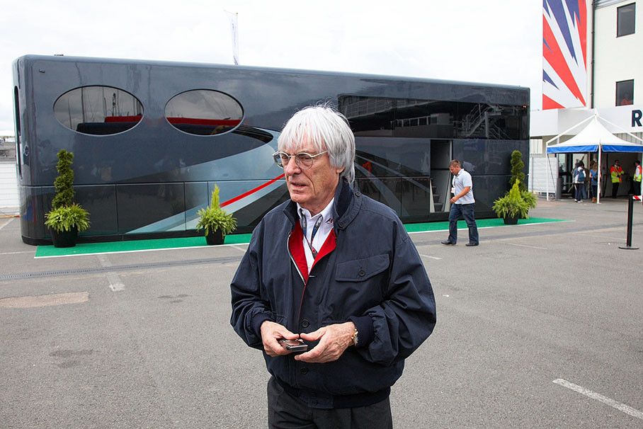 Bernie Ecclestone walks in Silverstone paddock