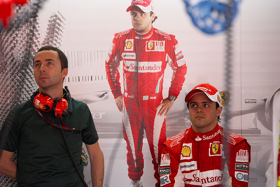 Felipe Massa in Ferrari pits with his manager Nicolas Todt