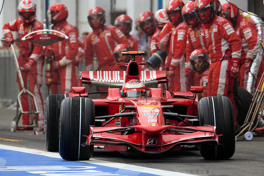 Raikkonen pits out from Ferrari pits in lap 52