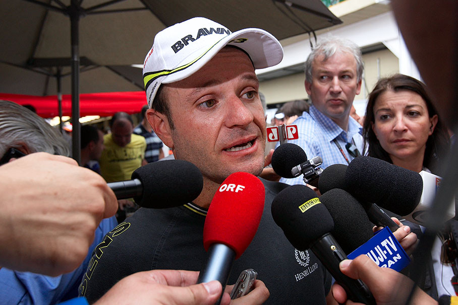 A seemingly unhappy Barrichello explains himself to the Brazilian media