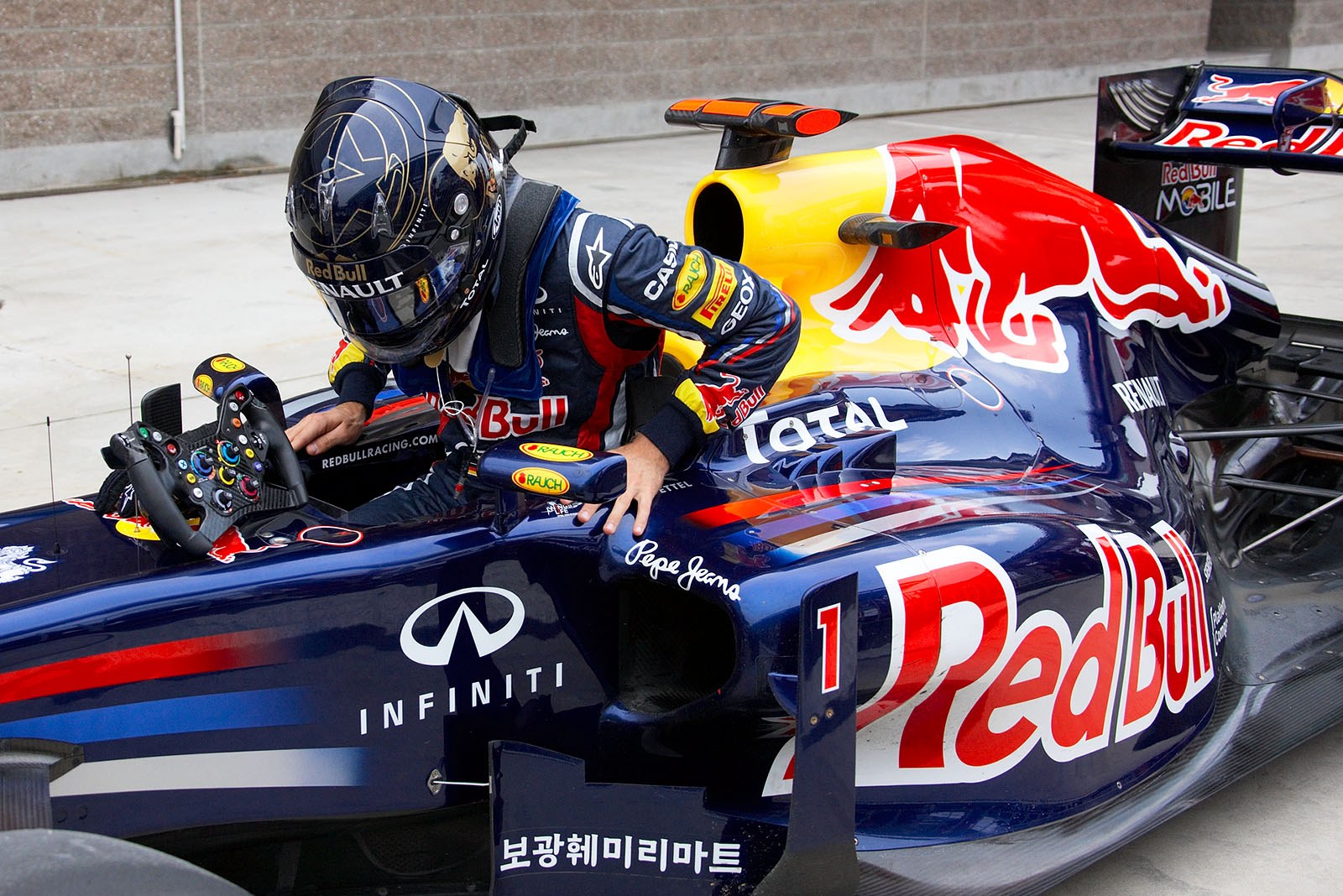 Second qualifier Sebastian Vettel gets out of his car in parc ferme