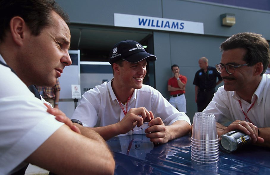 Ralf Schumacher between Gerhard Berger and Dr. Mario Theissen
