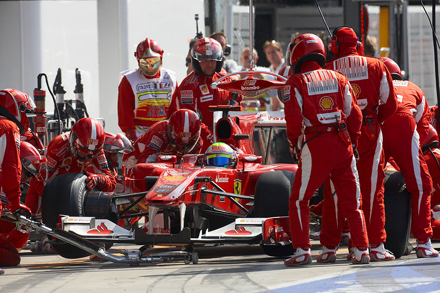 Felipe Massa changes tyres at Ferrari pits