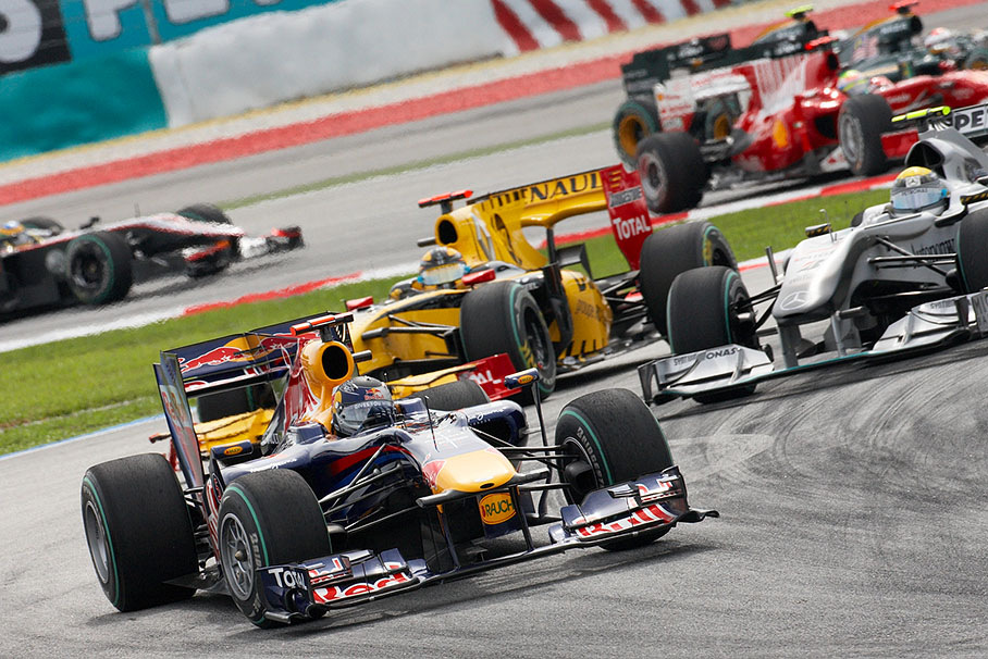 Early race leader Sebastian Vettel in front of Nico Rosberg and Kubica who row in as third and fourth