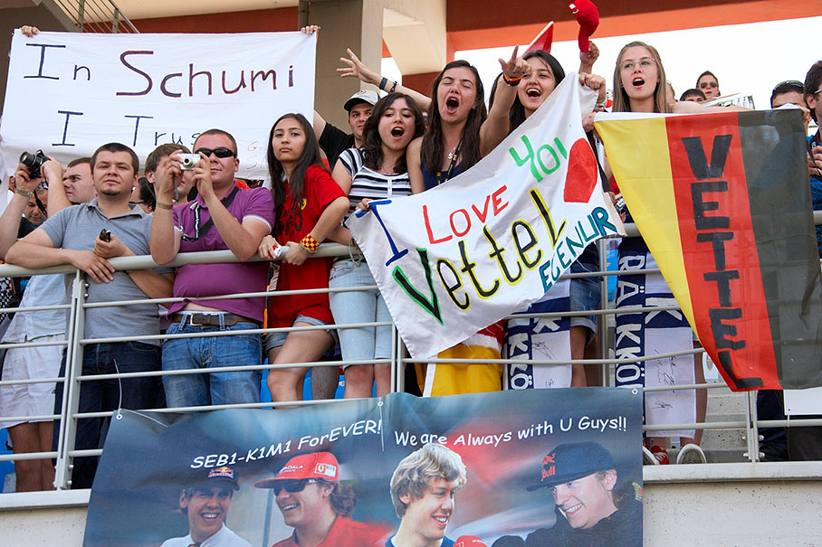 German fans cheer from the main grandstand