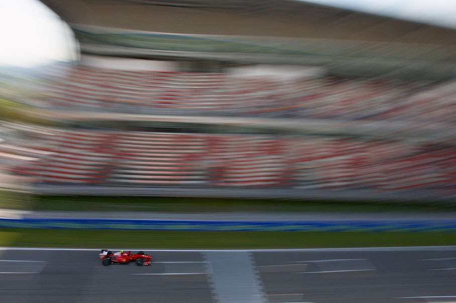 Kimi Raikkonen, Scuderia Ferrari, accelerates in front of the main grandstand