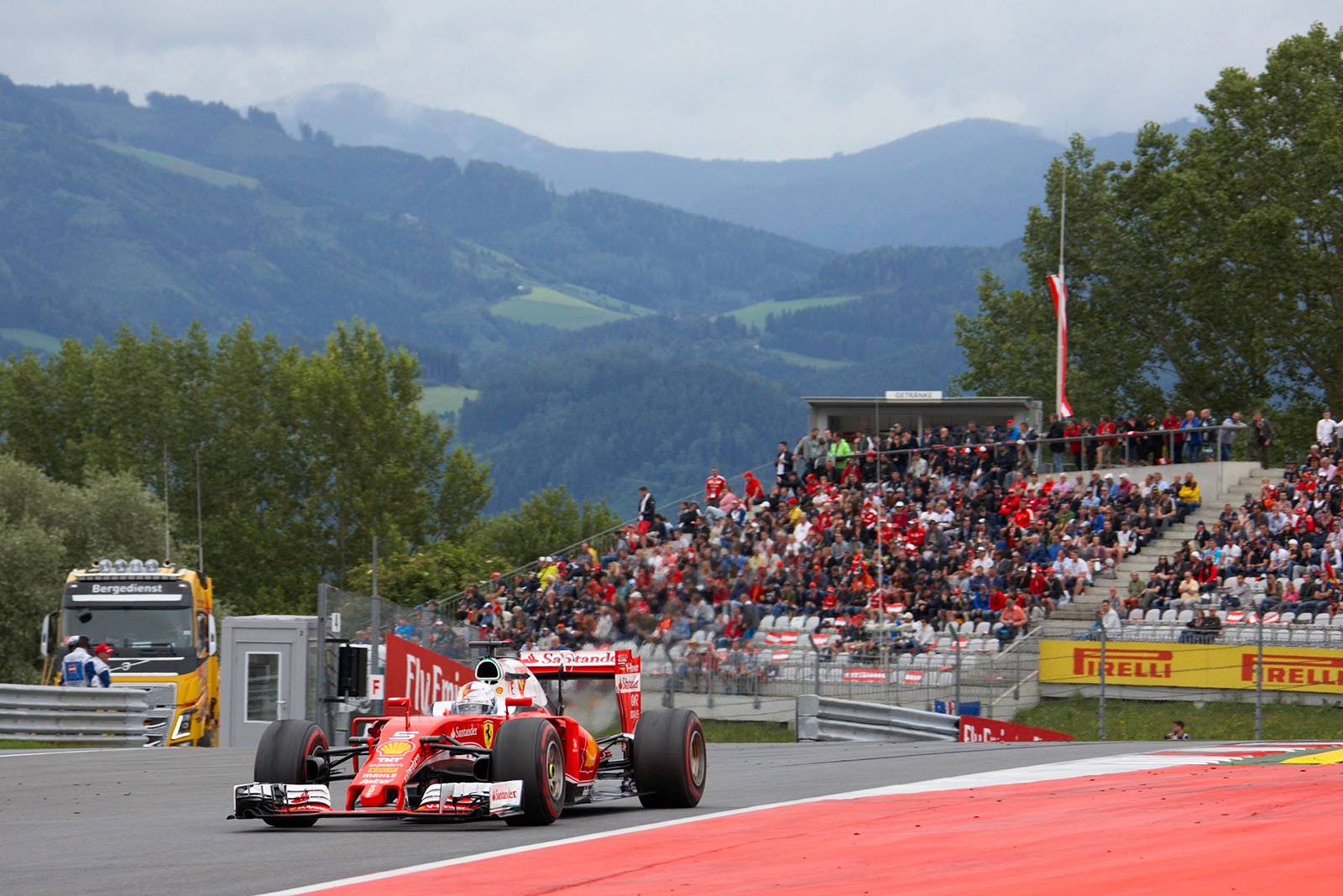 Sebastian Vettel, Ferrari, passing the Steiermark landscape, Spielberg, Austrian Grand Prix, 2016