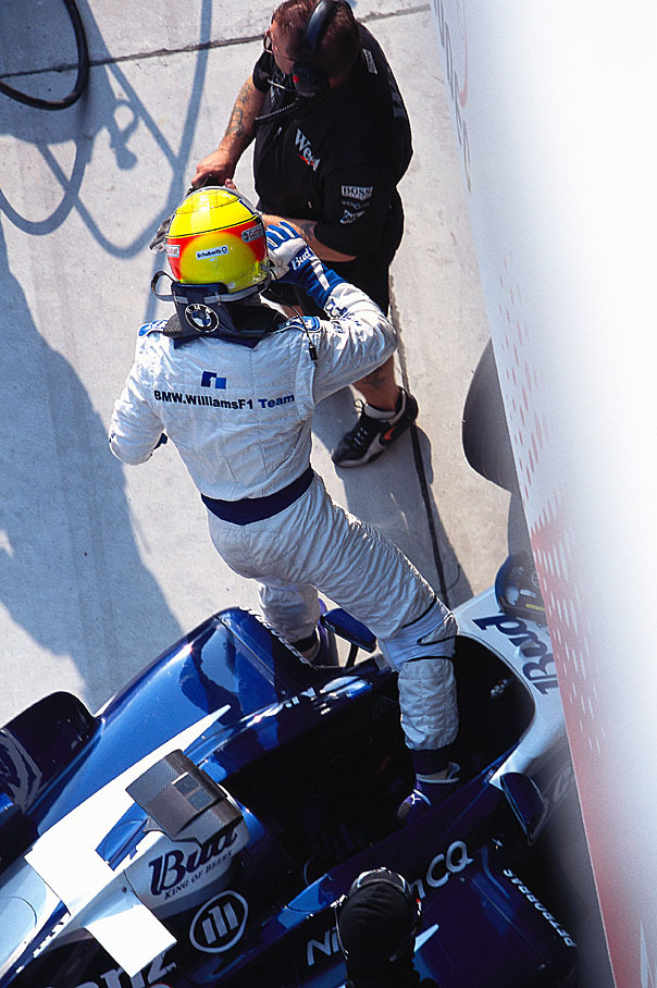 Ralf Schumacher jumping out of his car
