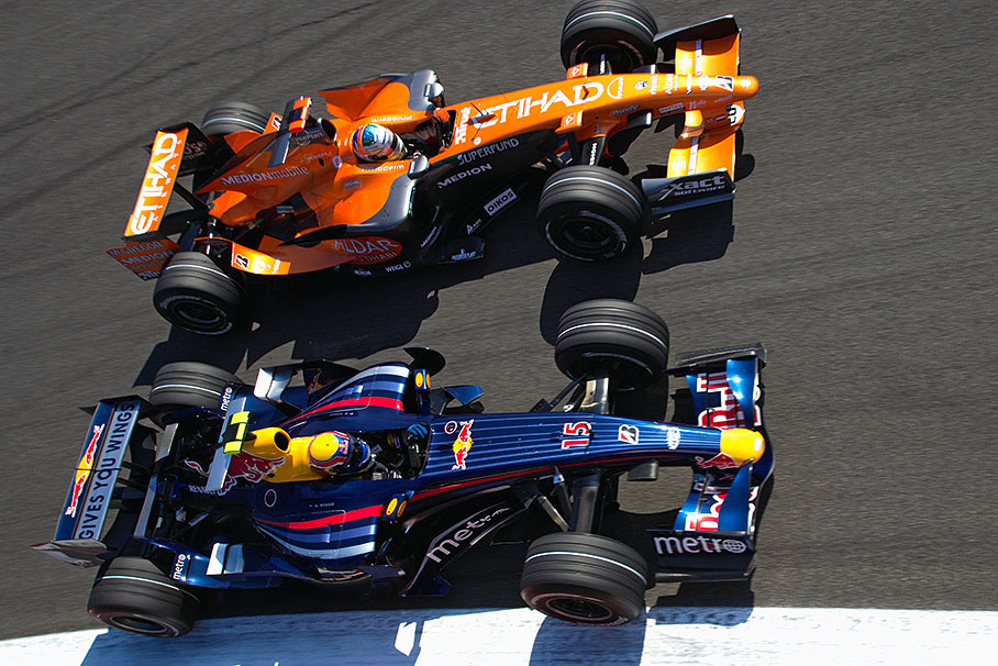 Overtaking manouevre in Parabolica between Red Bull's Mark Webber and Spyker driver Adrian Sutil