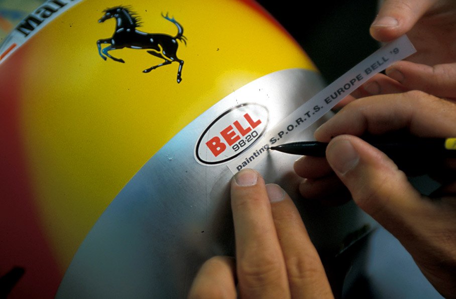 Peter Ginneken of BELL Helmets S.A. making the artwork of the 1998 Suzuka race helmet for Michael Schumacher