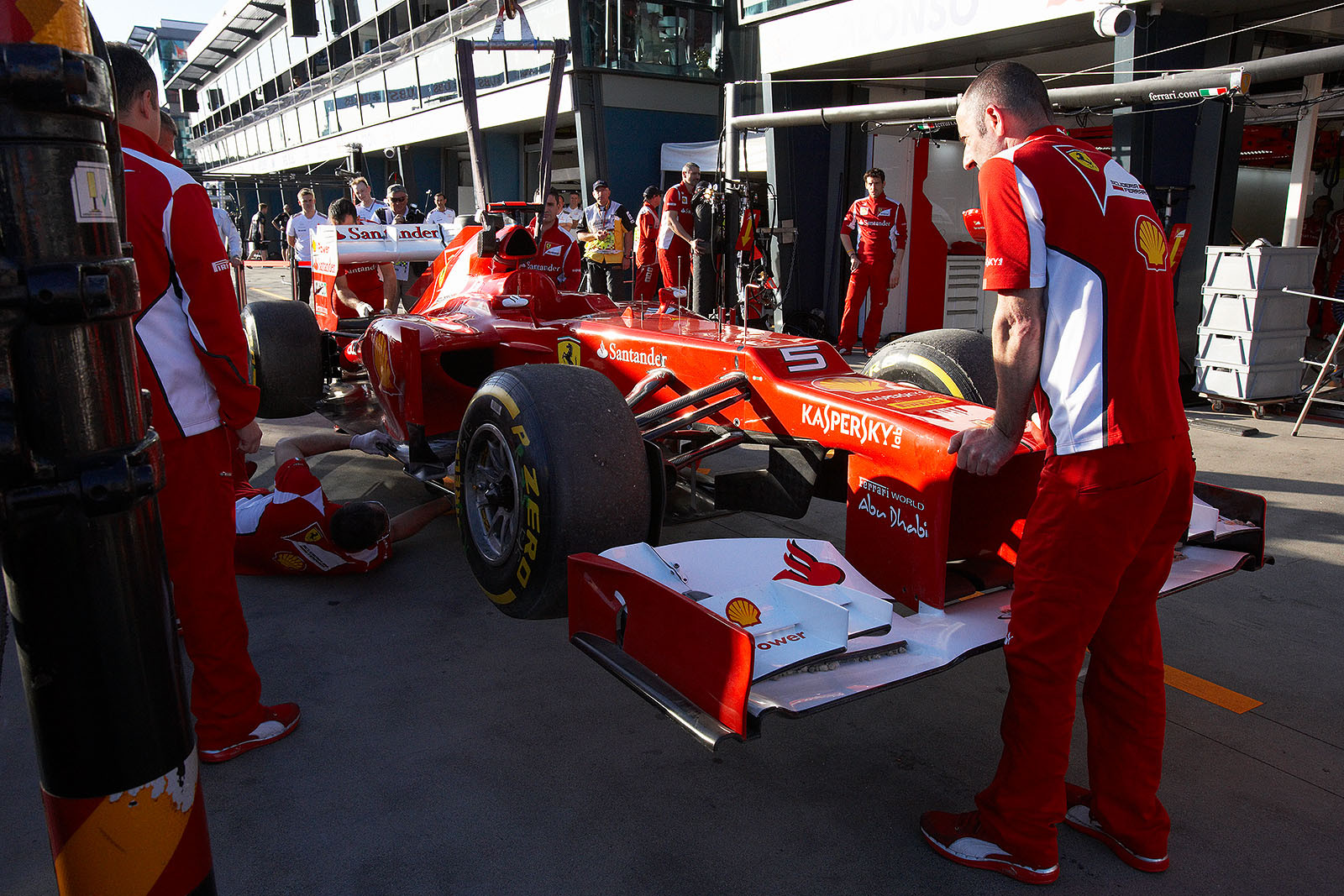Alonsos Ferrari is returned to pits after qualifying