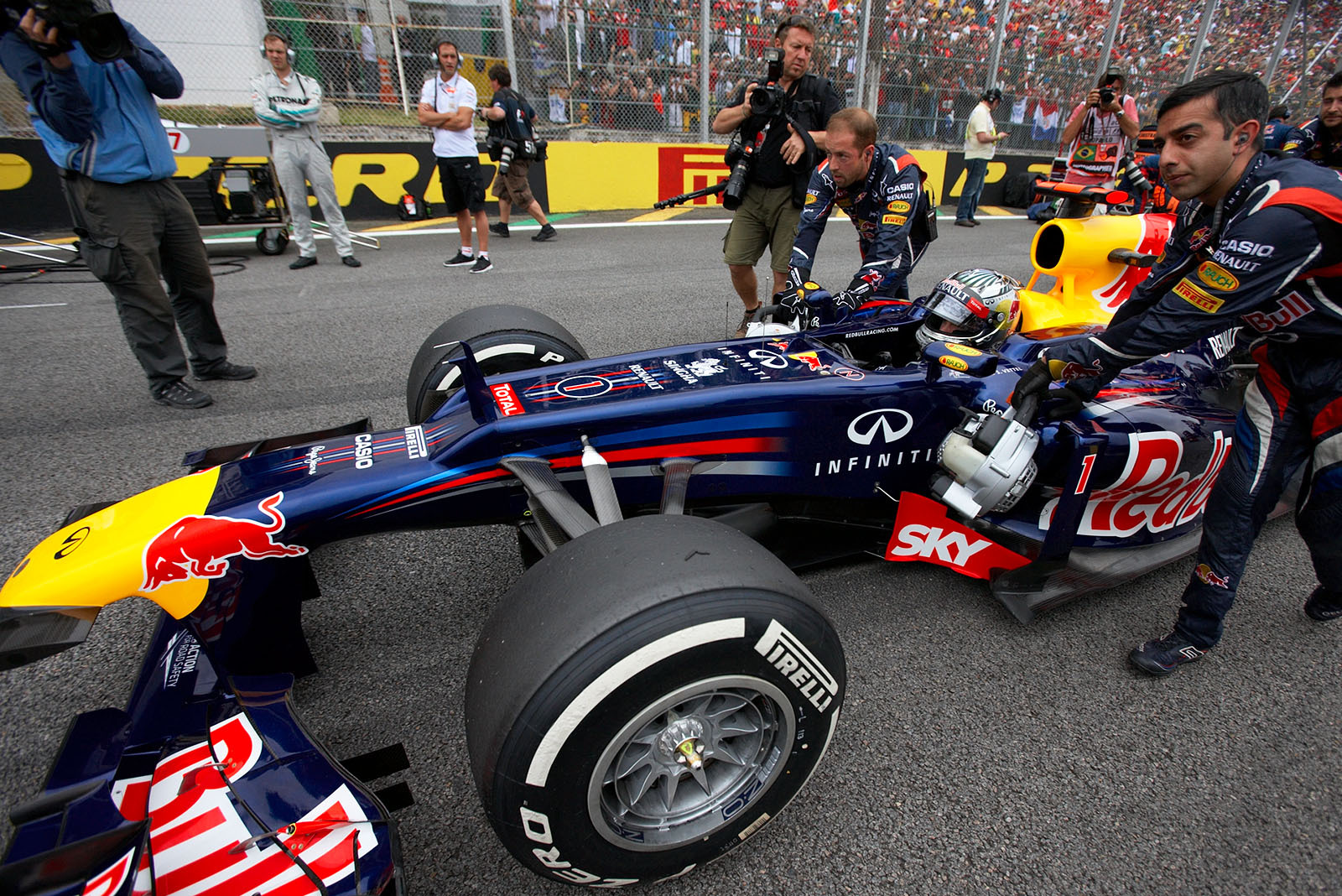 Sebastian Vettel, Red Bull Racing, is pushed to his grid position