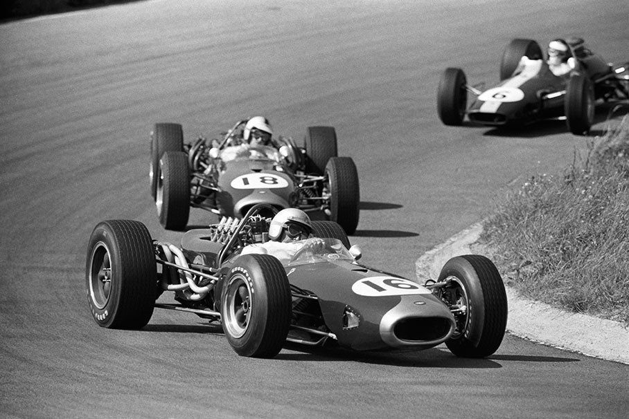 Race winner Jack Brabham on Brabham-Repco BT19 leads in front of Denny Hulme in a Brabham-Repco BT20 and Clark on Lotus, Dutch GP Zandvoort 1966