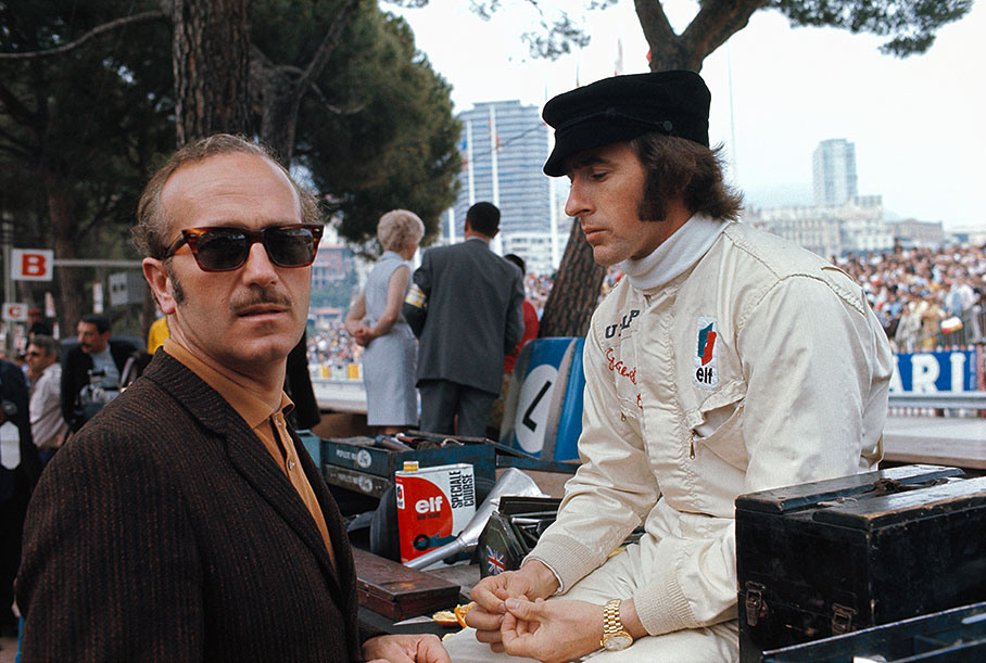 Lotus team boss Colin Chapman with Tyrrell driver Jackie Stewart