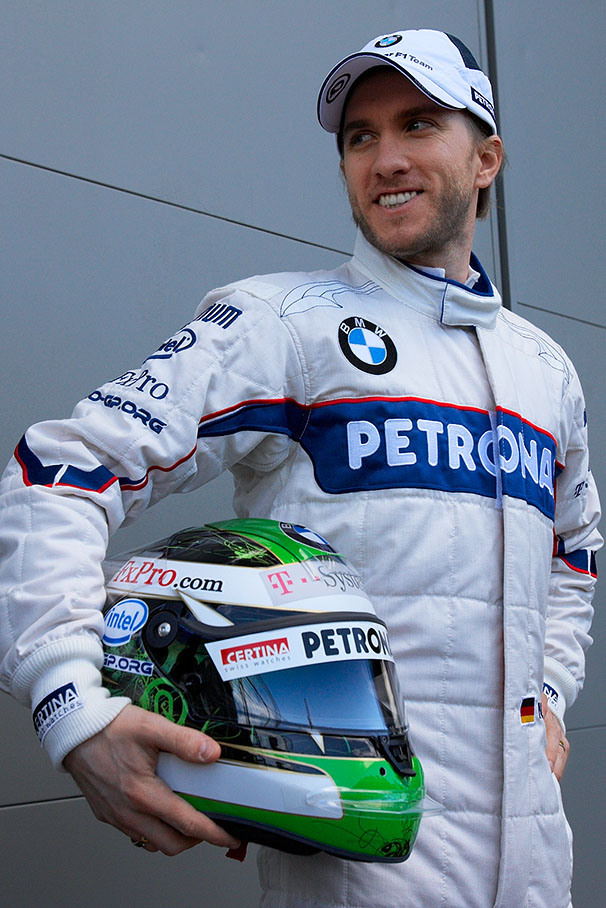 Nick Heidfeld shows a refreshed smile for the photographers at the seasons first day