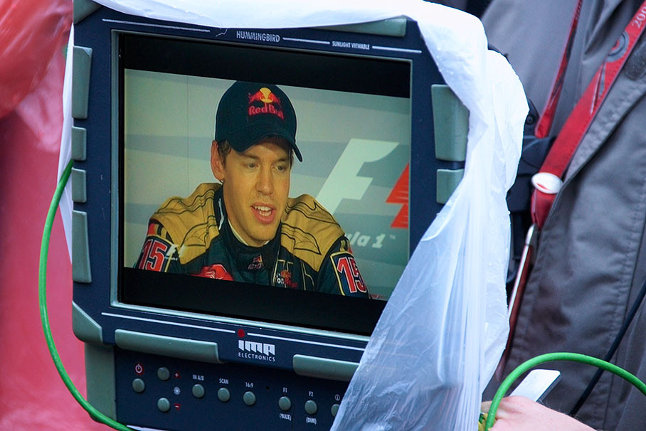 Sebastian Vettel at the post qualifying press conference on a TV monitor