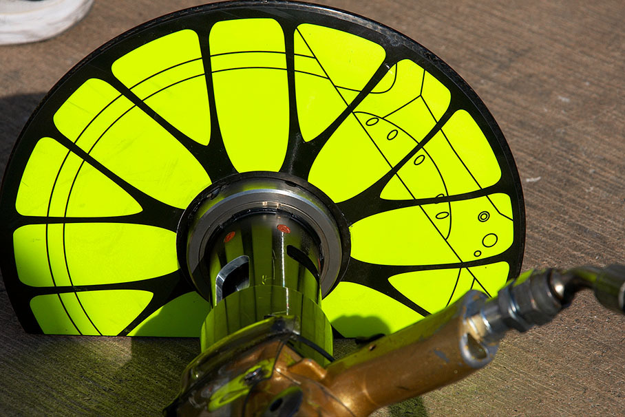 A wheel rim attached to an air gun at Brawn GP's pits