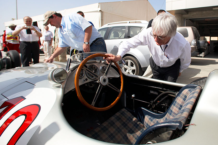 Bernie Ecclestone checks the interior of a World Championship-winning silver arrow (Fangio's 1954 Mercedes-Benz W196)