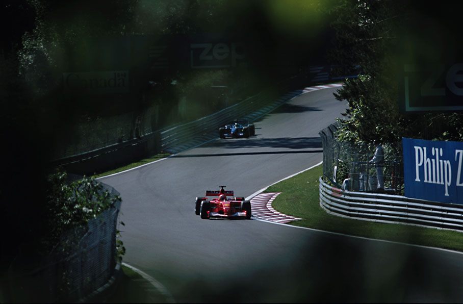 Michael Schumacher driving between the leaves